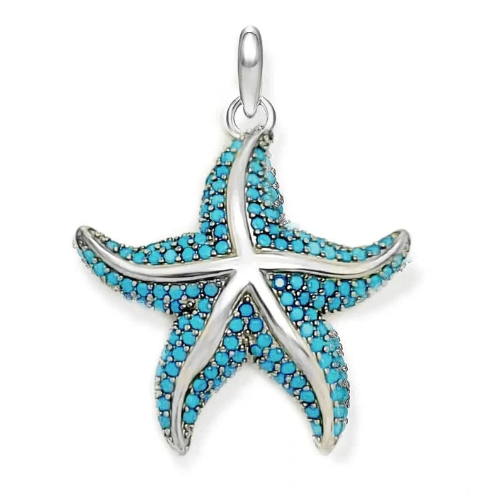 Blue starfish sterling silver pendant on white background