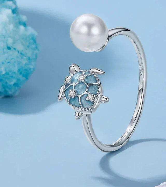 Turtle ring with pearl and blue detailing